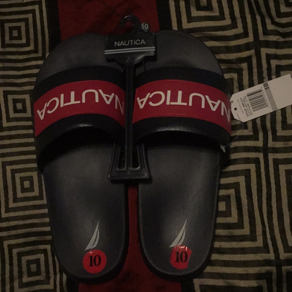 A brand new pair of Nautica slides.